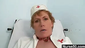 Mature woman performs self-examination on gynecologist's chair with sex toy amateur dildo masturbation