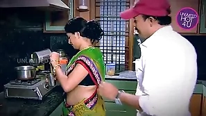 Mature Indian wife gives in to temptation with her young neighbor in the kitchen aunty desi indian