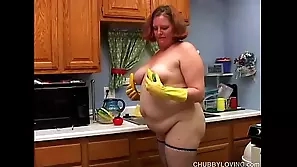 Mature woman satisfies herself with a solo masturbation in the kitchen ass boobs booty